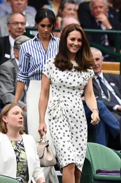 Kate sorride entrando nel Royal Box con la cognata Meghan, amica di Serena Williams